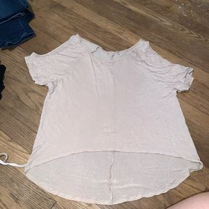 Loose t-shirt with cut outs on the sleeves